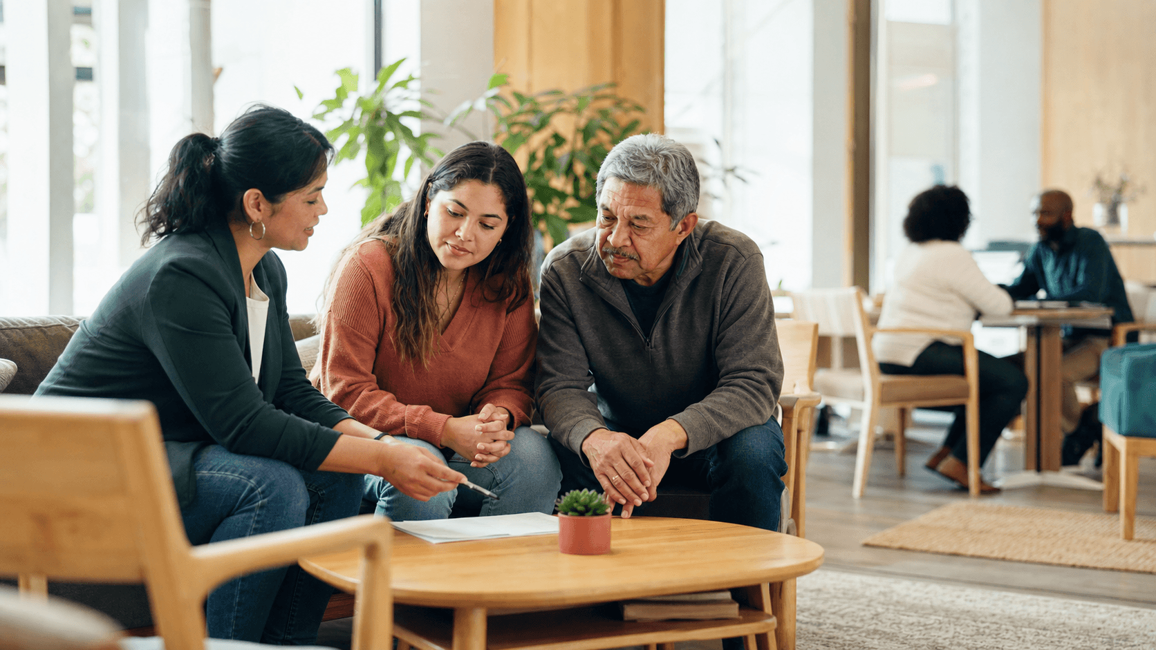 A family meeting with a fictional Kindred Harbor resource navigator